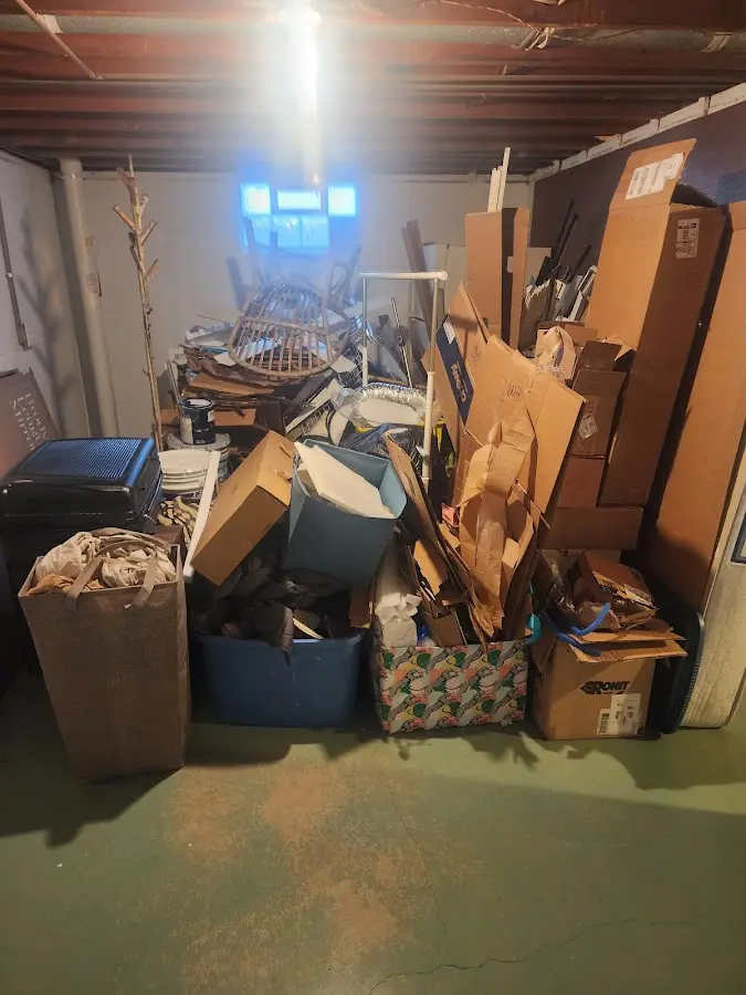 Roll-off dumpster container at job site for 2 Yard Dumpster Rental in Asheboro